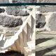 Table basse en verre et travertin