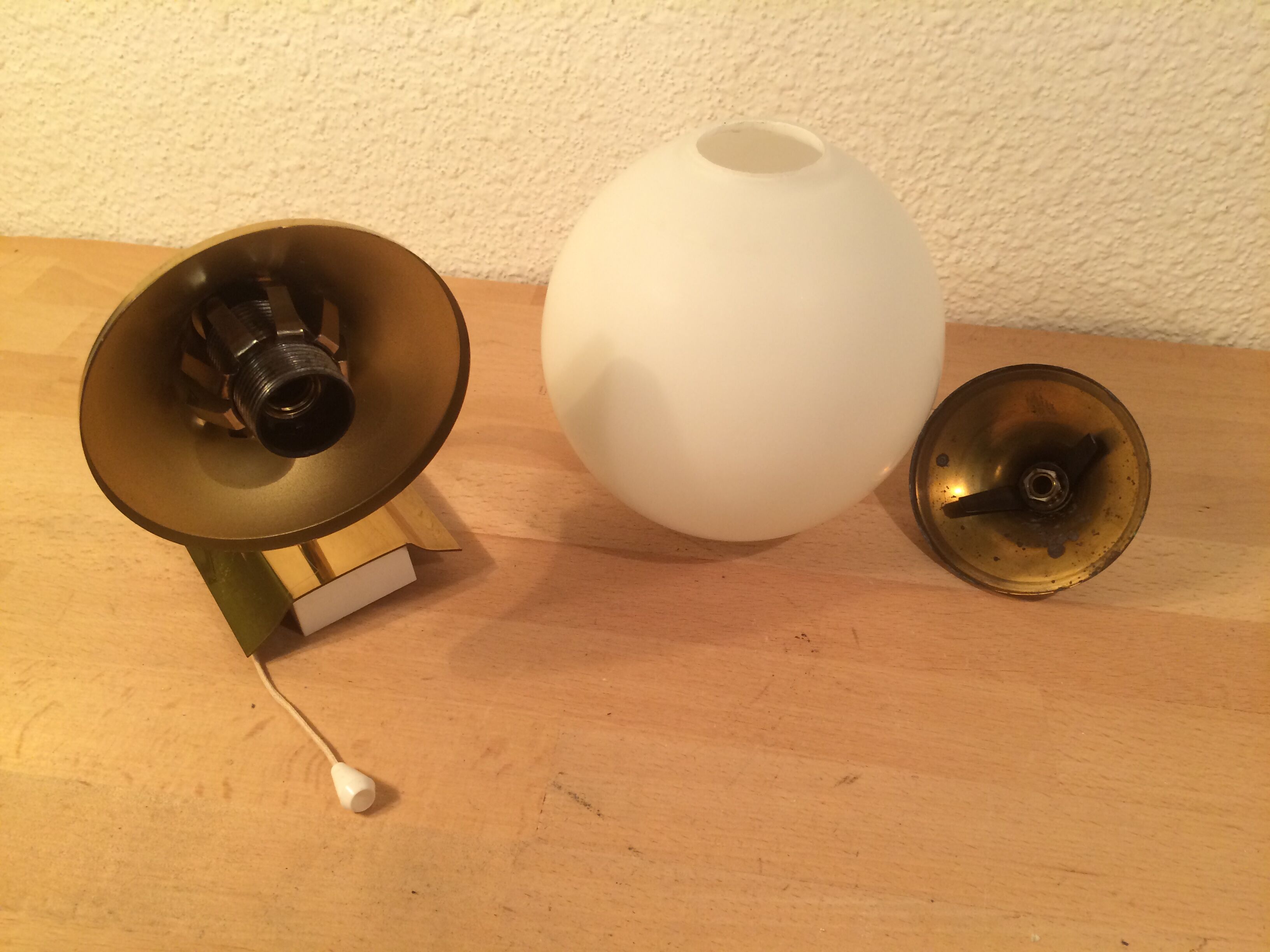 Brass and opal globe wall lamp from the 60s