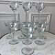 Set of 11 molded glass wine glasses engraved 20s