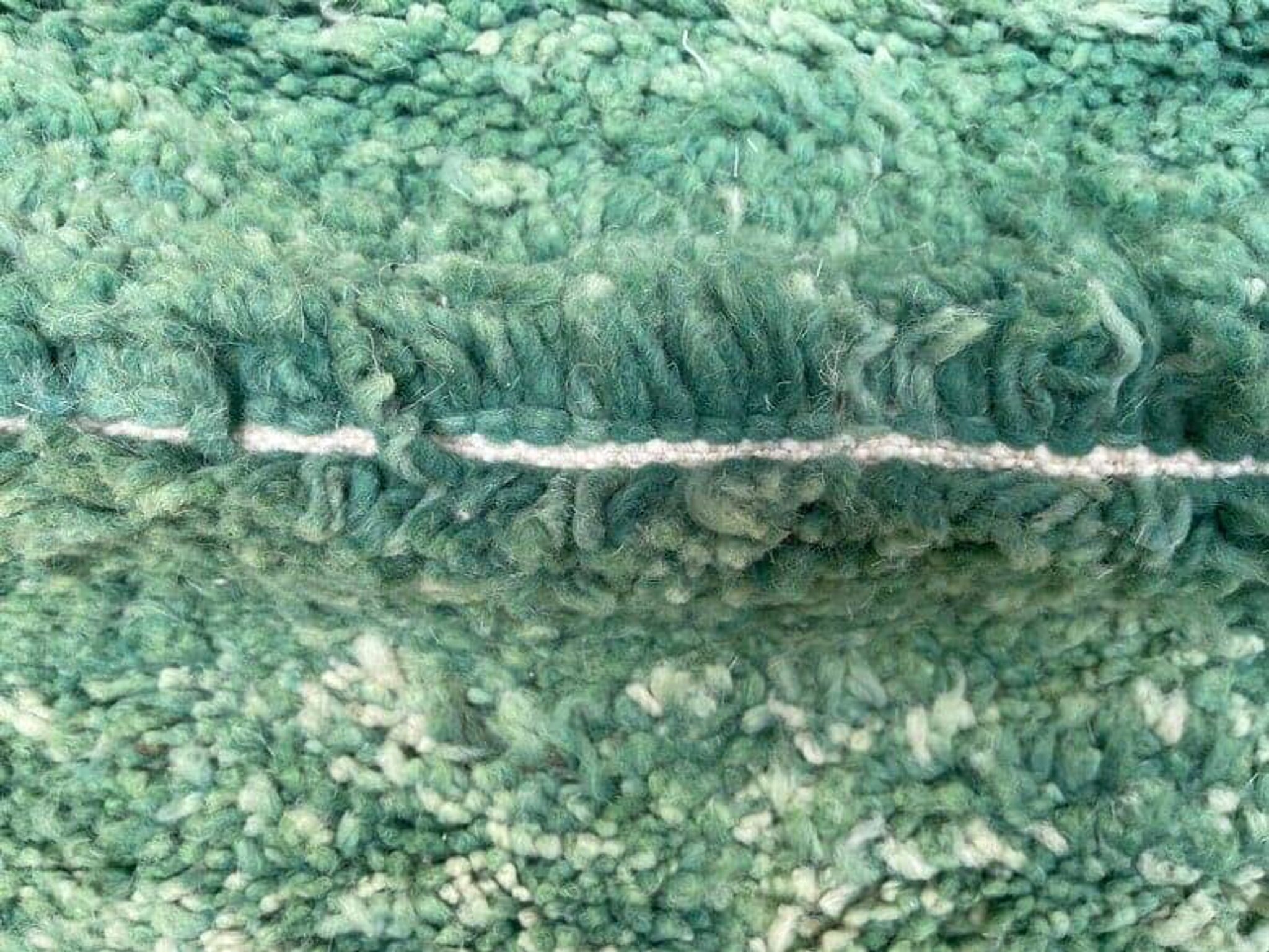 Handmade pure wool rug, size 150 x 250 cm.