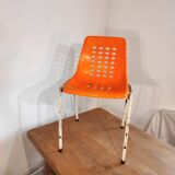 Chair with openwork plastic shell 1970