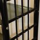 Vintage 1970s shelf in smoked glass with a bamboo-style structure.