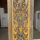 Rectangular Indonesian construction element with blue and yellow plant in carved wood