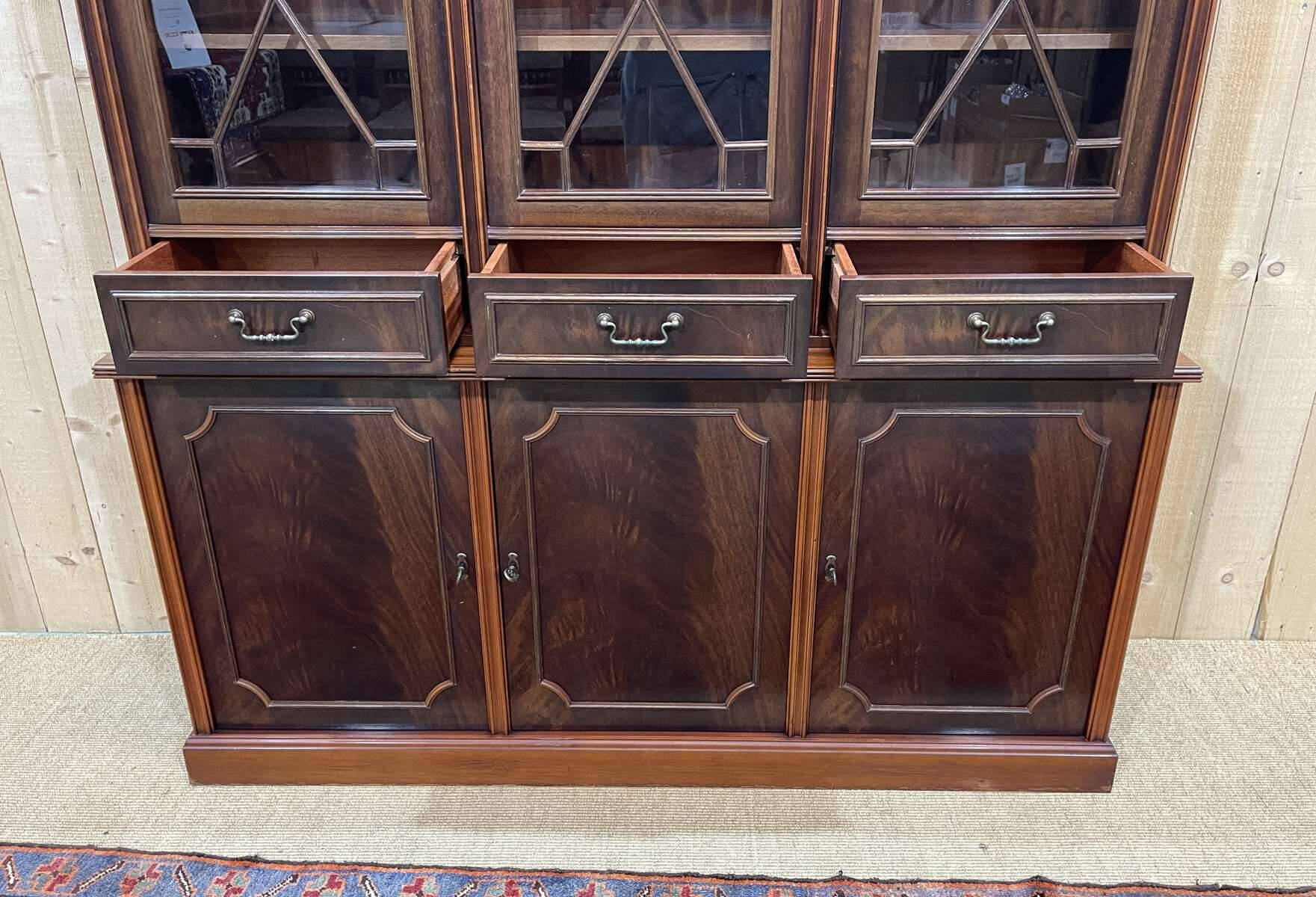 English two-piece mahogany bookcase, made in the 1970s