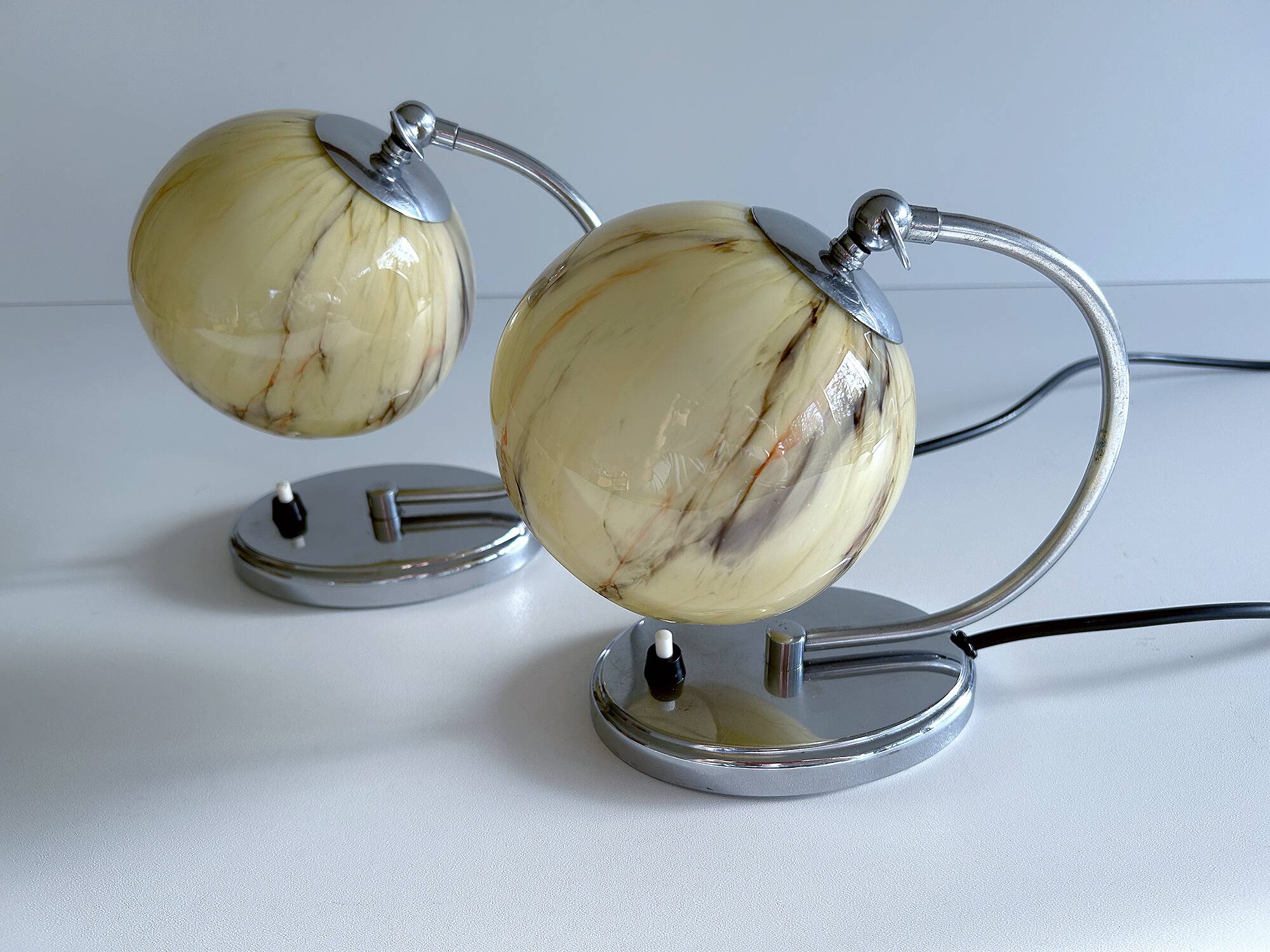 Pair of art deco lamps, chrome glass
