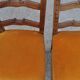Pair of mid-century chairs from the 1950s in brown oak and straw yellow velvet — set of 2
