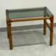 Table basse bois blond et verre fumé à ligatures cuir