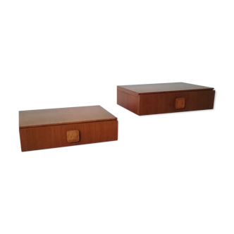 A pair of wall bedsides
