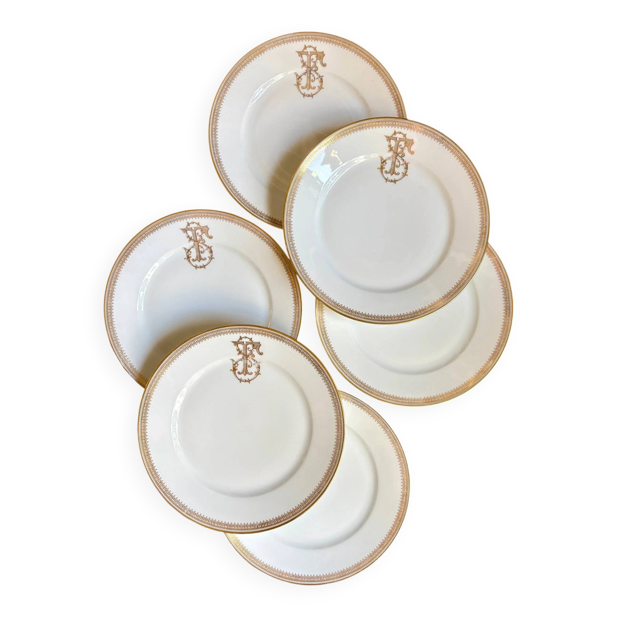 6 flat plates in gold porcelain monogrammed "F"