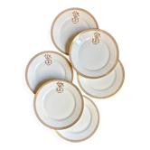 6 assiettes plates en porcelaine dorée monogrammée "F"