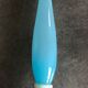 Vase soliflore in opaline turquoise blue color and white foot 24 cm