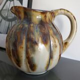 Ceramic pitcher in the shape of a coloquinte melo.