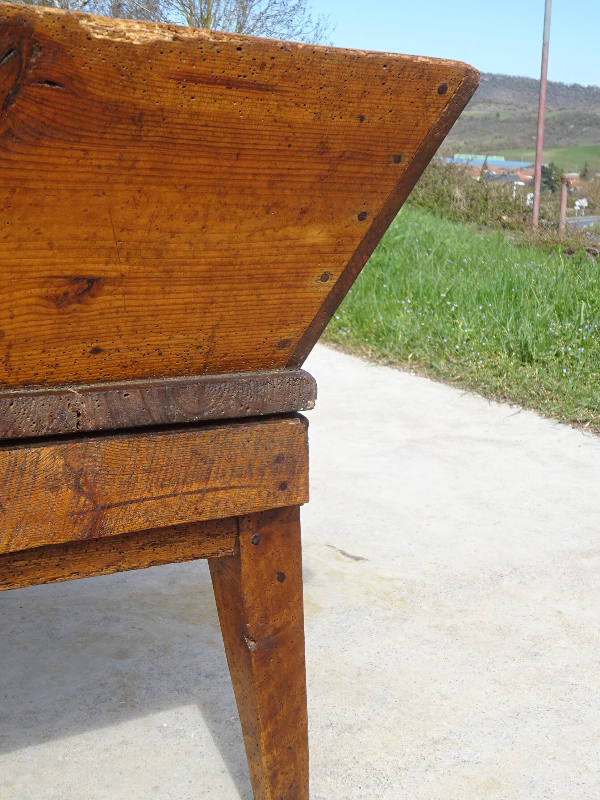 Very old solid oak dough trough with a lid and removable legs.