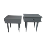 Duo of bedside tables, mismatched vintage sofa ends green of gray