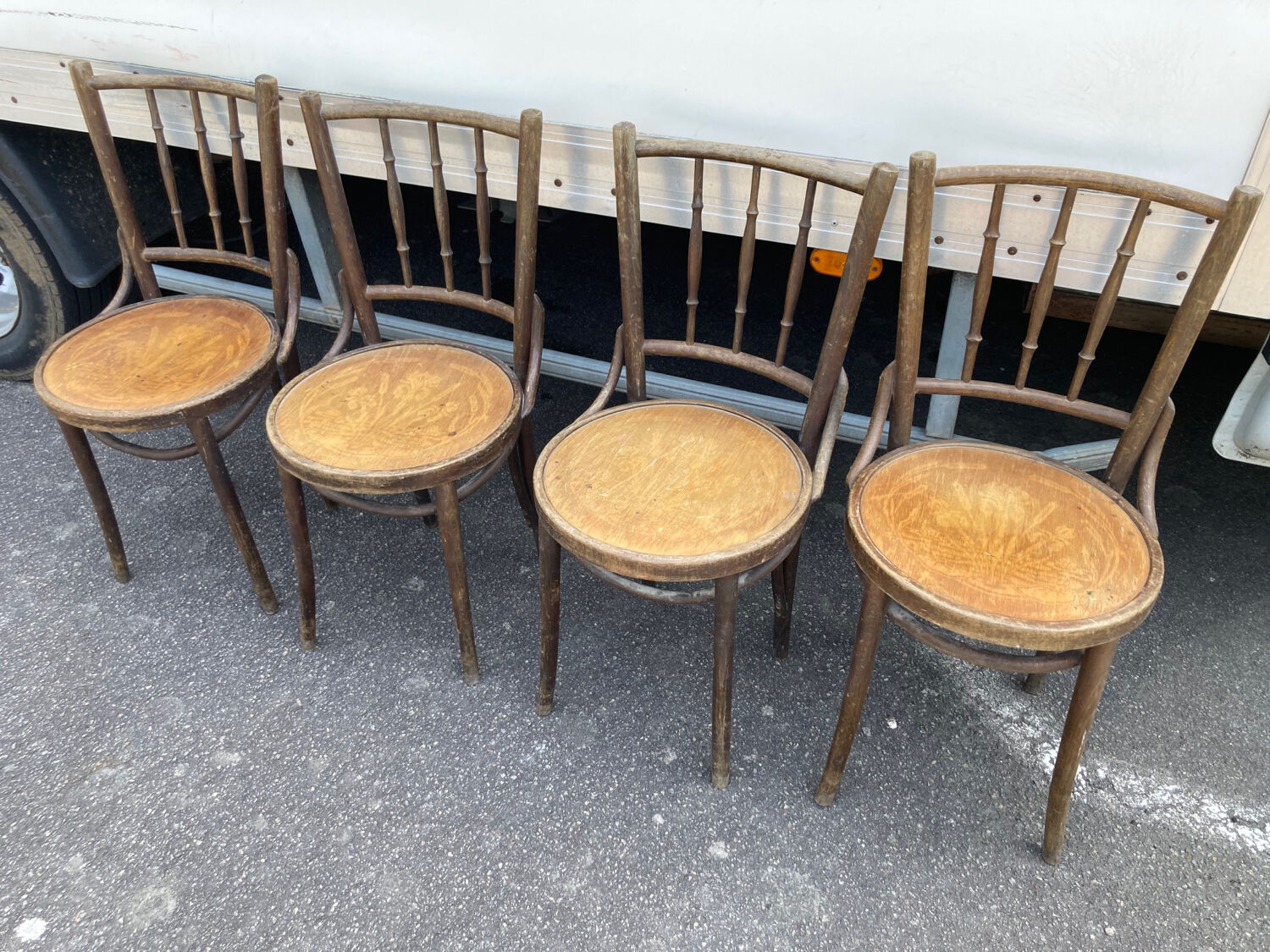 4 curved wooden bistro chairs