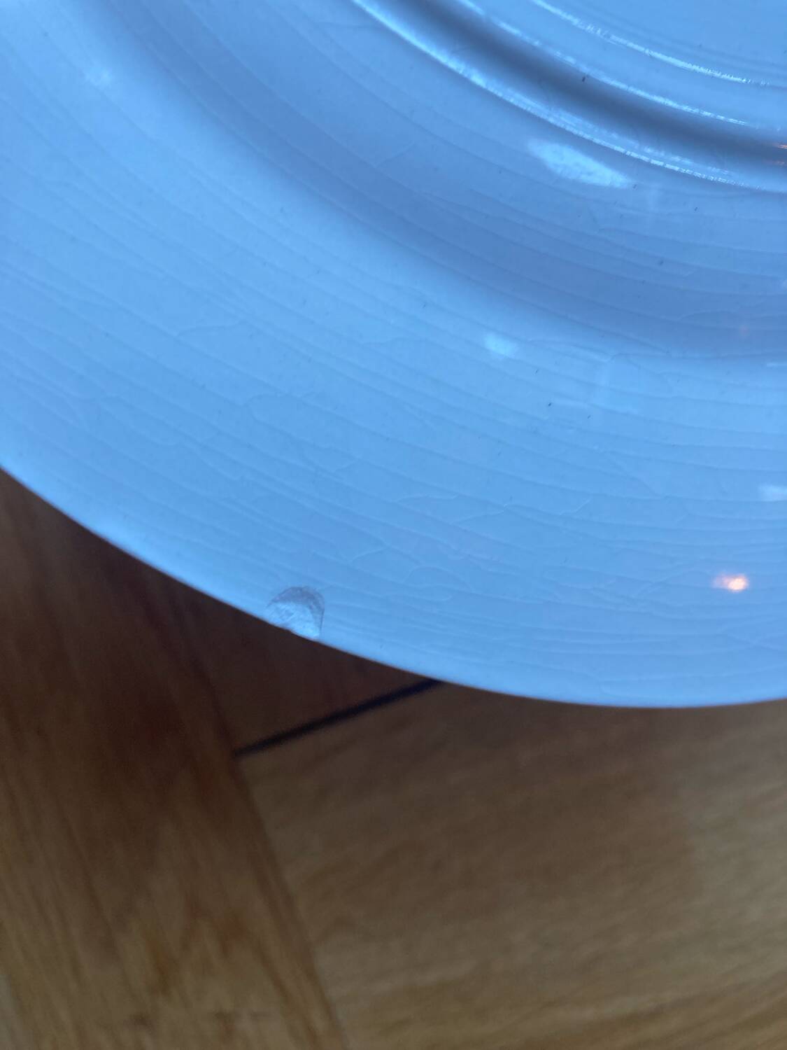 Flat plates Aude Sarreguemines with a rose flower design.