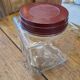 Ancient moulded glass jar with bakelite lid 20th century