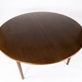 Dining table in dark oak of danish design from the 1960s.