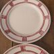 Eight Badonviller dinner plates
