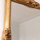 Vintage rectangular giltwood bevelled mirror with rose accents