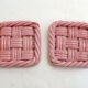 Woven pair of bottle coasters, in pink Vallauris earthenware.
