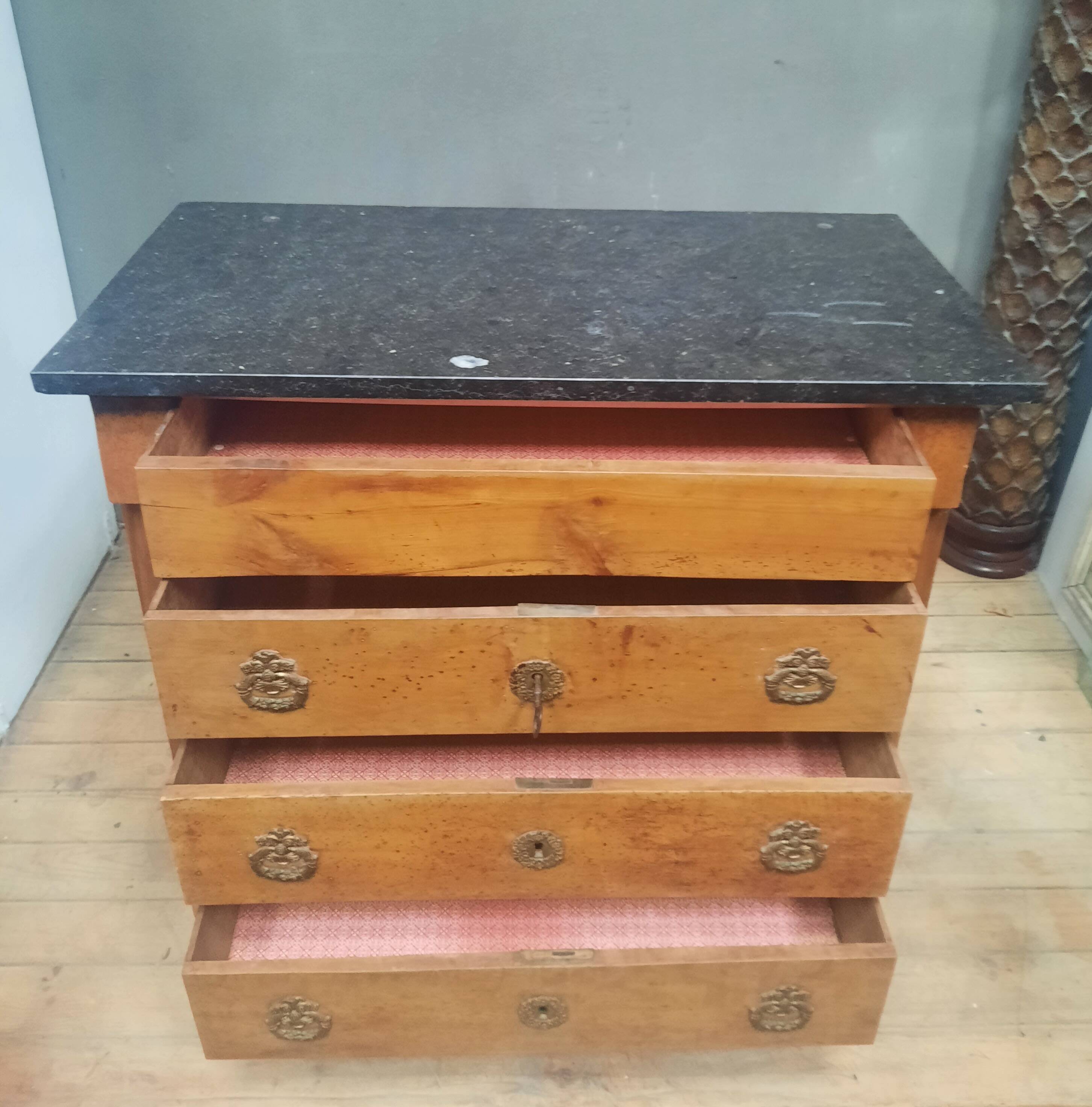 Nineteenth-century commode with marble top.