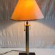Table lamp base in leather and brass - 50s design