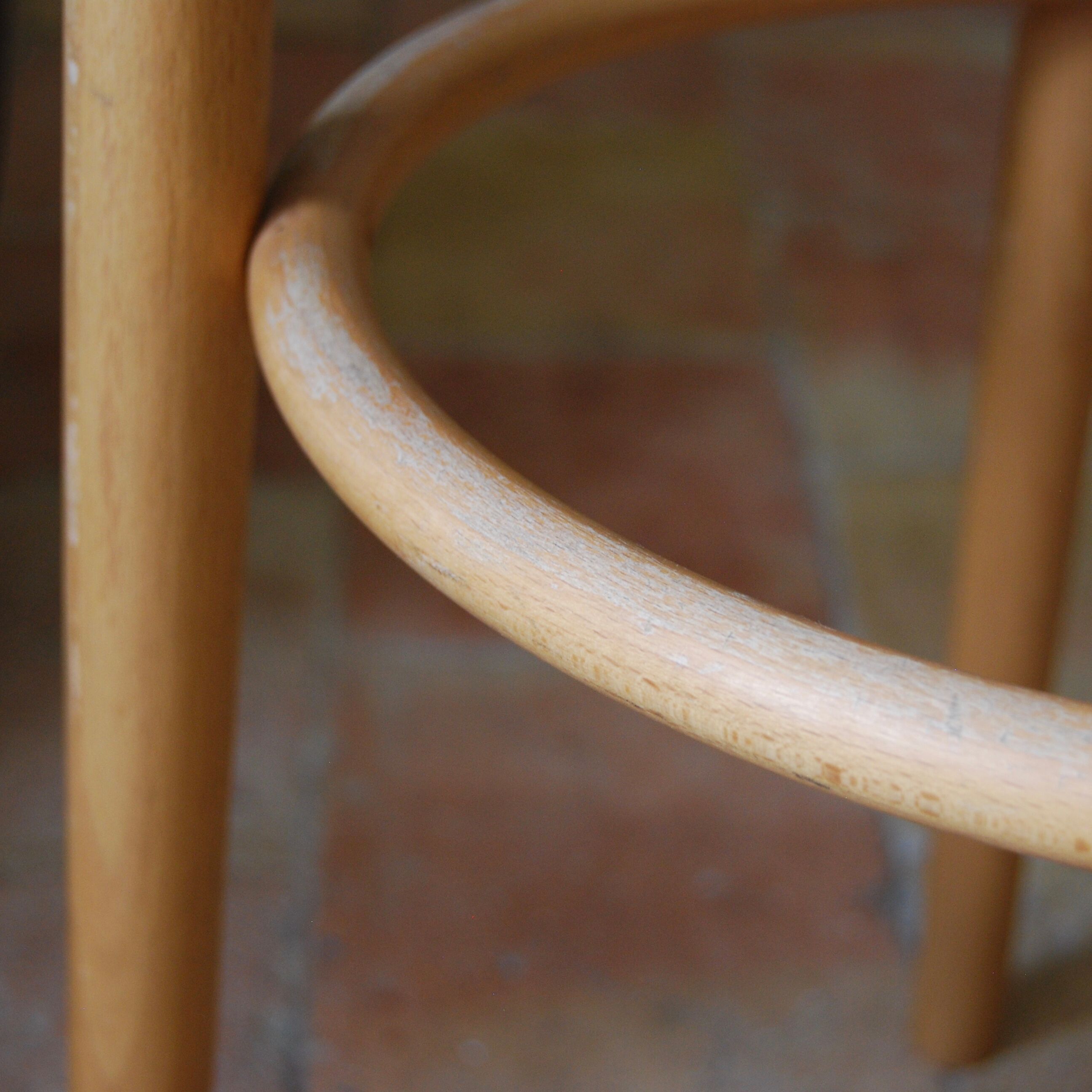 Wooden bar stools and cane
