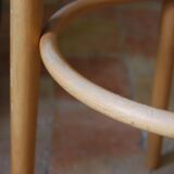 Wooden bar stools and cane