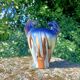 Ceramic vase with equestrian motif