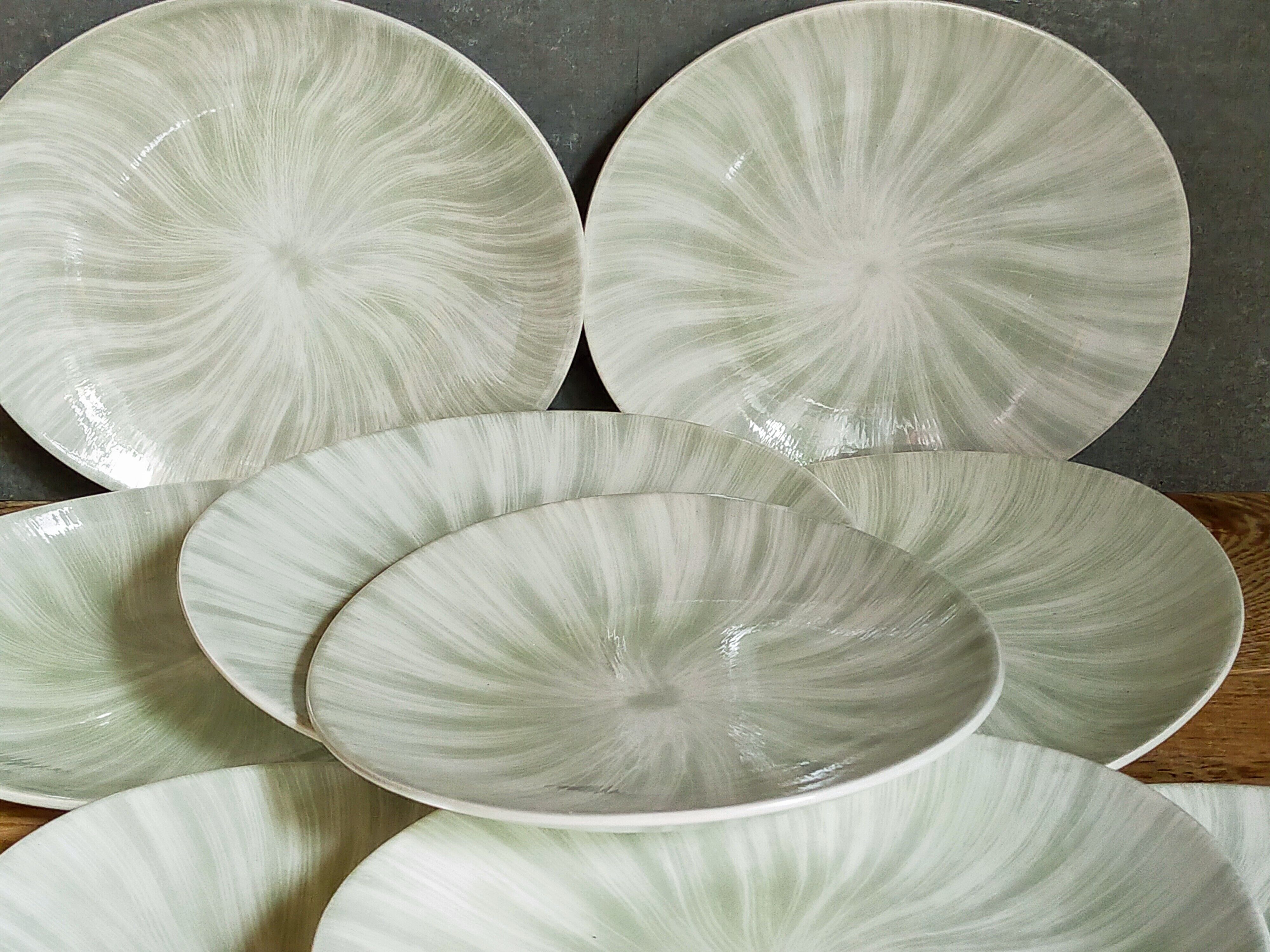 Nine earthenware plates from Salins-les-Bains vintage