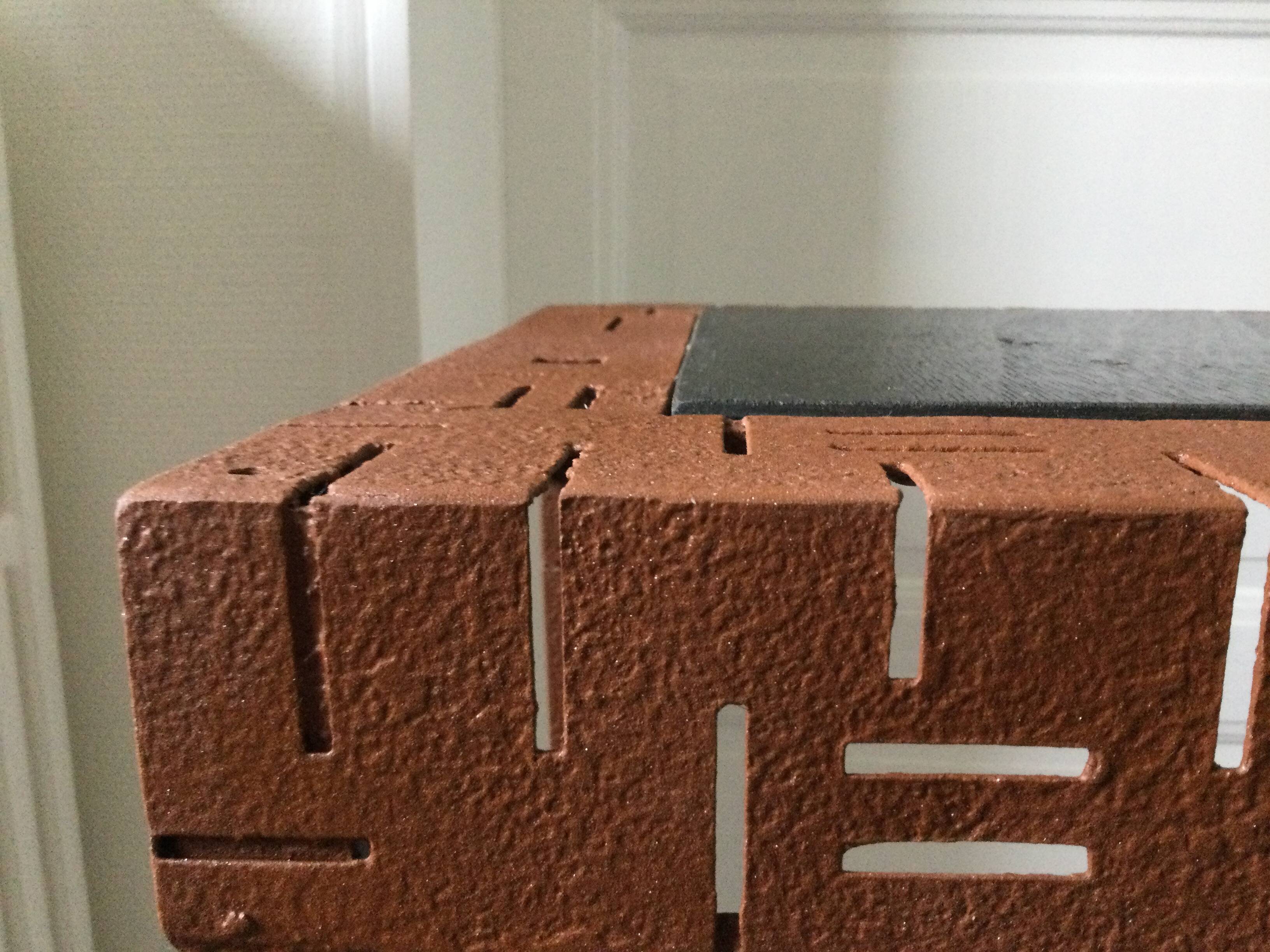 Perforated sheet metal and wood console