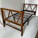 Two-seater bench convertible into a single bed.