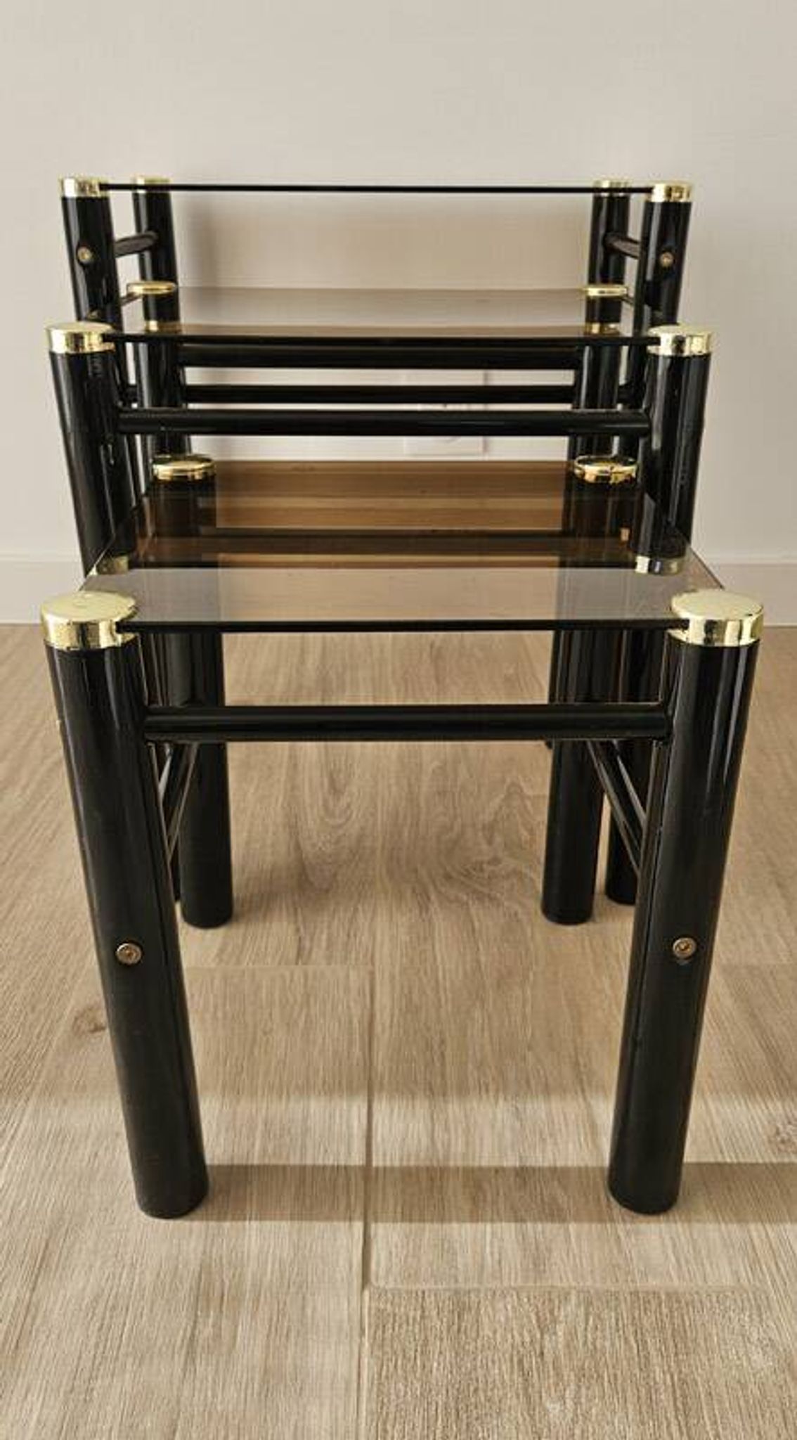 Set of 3 vintage nesting tables in smoked glass and black metal – 1970s