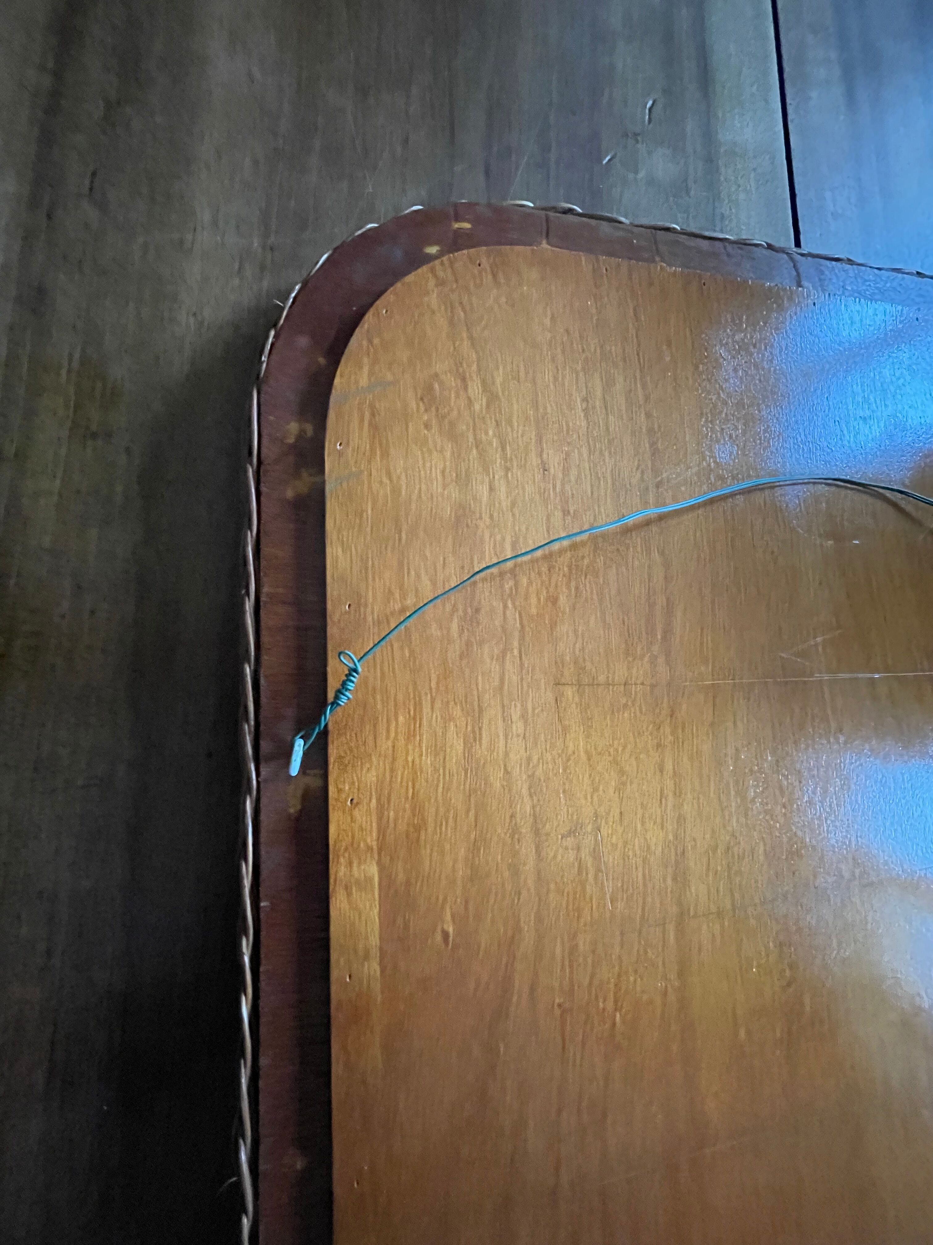 Curved rattan mirror 70s