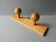 Wall coat rack with 2 pine ball hooks
