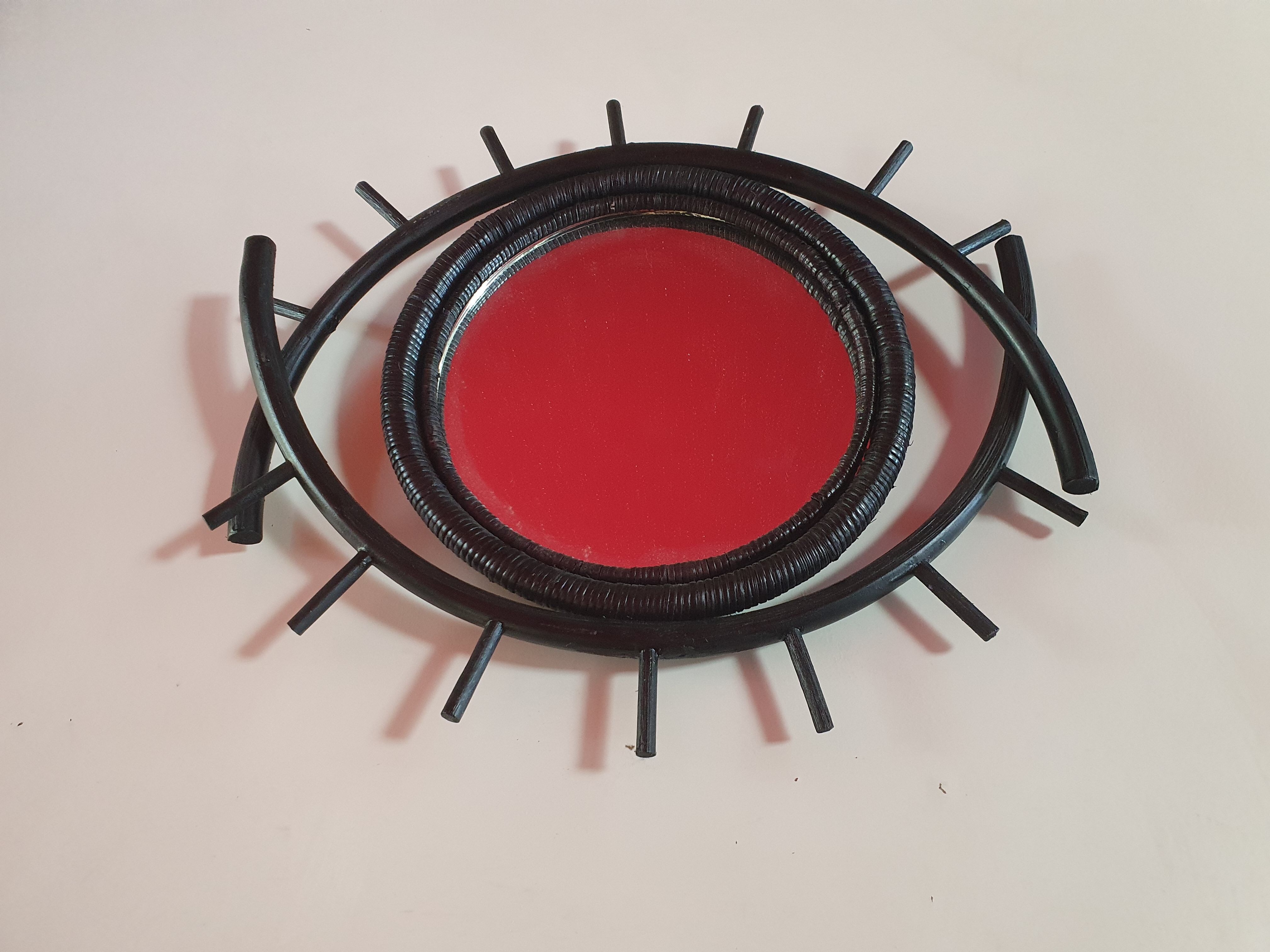 Miroir en rotin noir en forme d'oeil, 40x35 cm