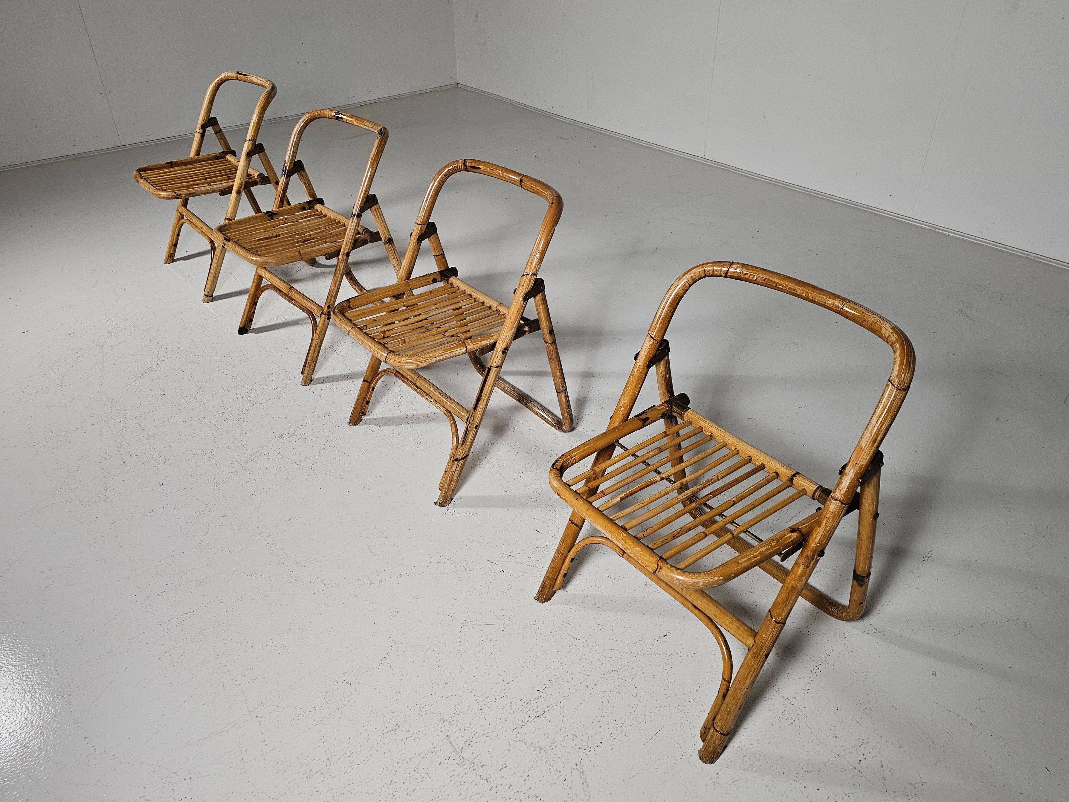 Set of 4 Dal Vera bamboo folding chairs, brass details, Italy, 1960s.