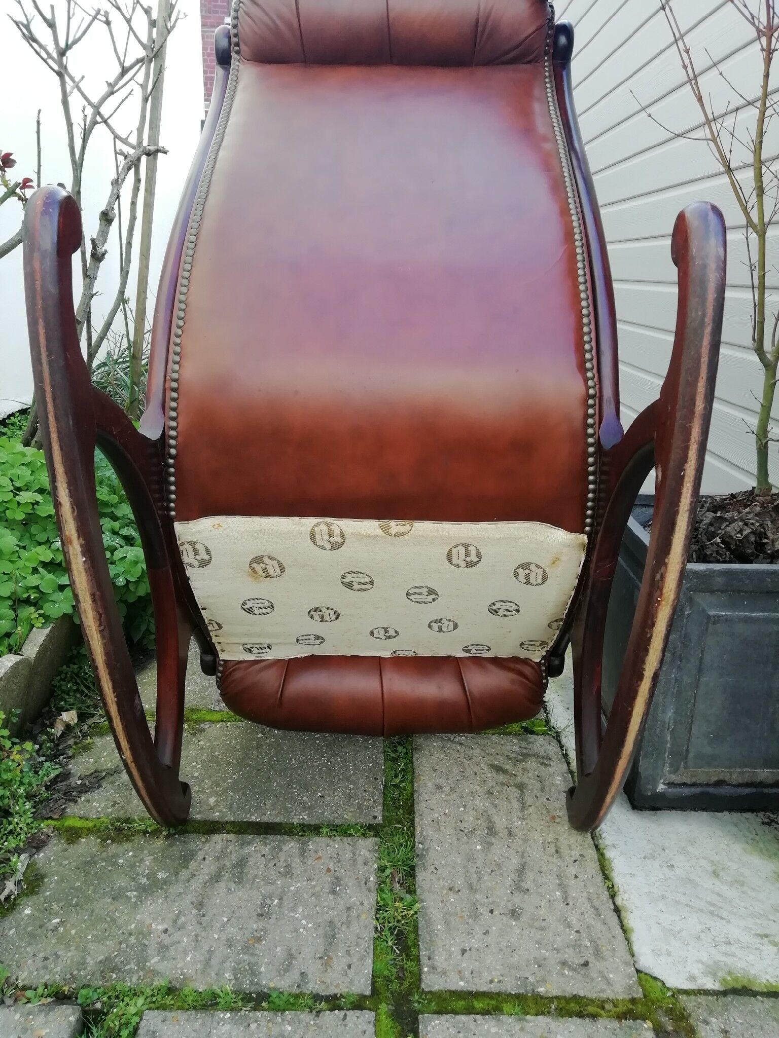 Rocking leather Chesterfield