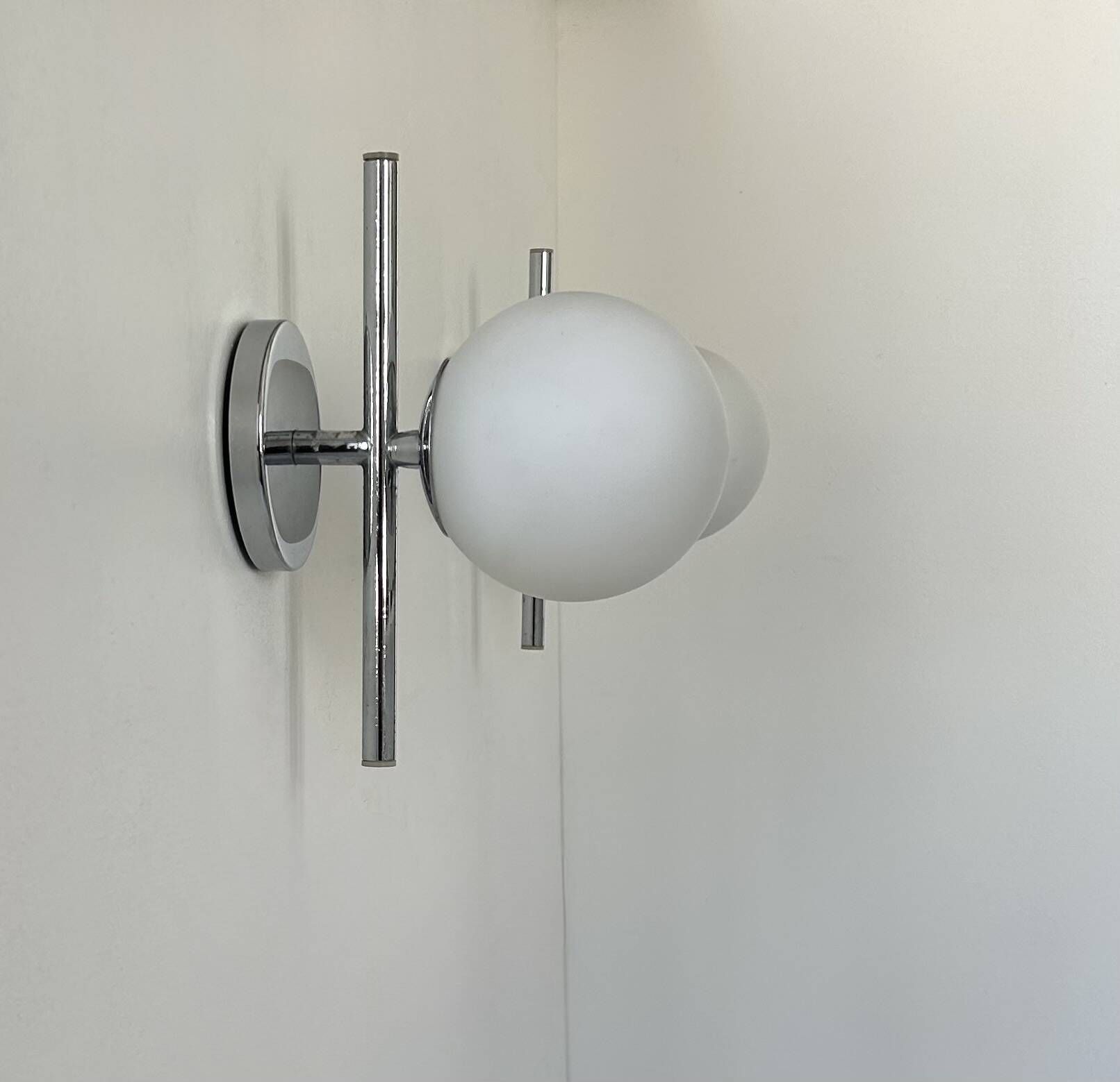 Pair of vintage chrome and opaline wall lights, France 1970.