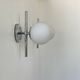 Pair of vintage chrome and opaline wall lights, France 1970.