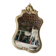 Antique bevelled baroque mirror in patinated wood