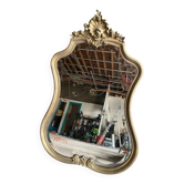 Antique bevelled baroque mirror in patinated wood