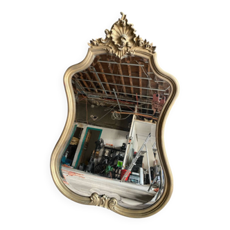 Antique bevelled baroque mirror in patinated wood