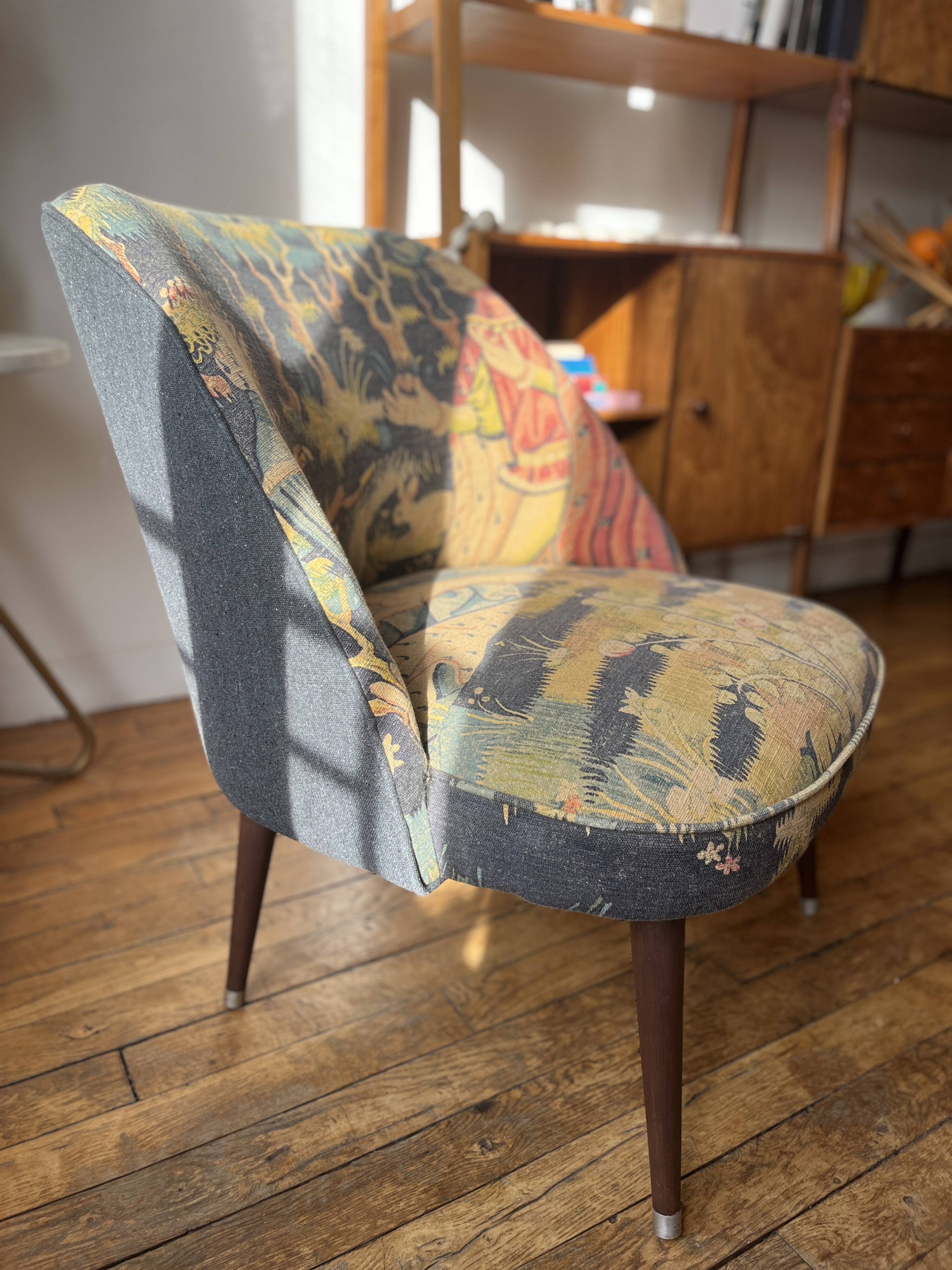 J. Tenreiro, Brazil. Concha armchair with tapered legs, Cluny tapestry 1400.