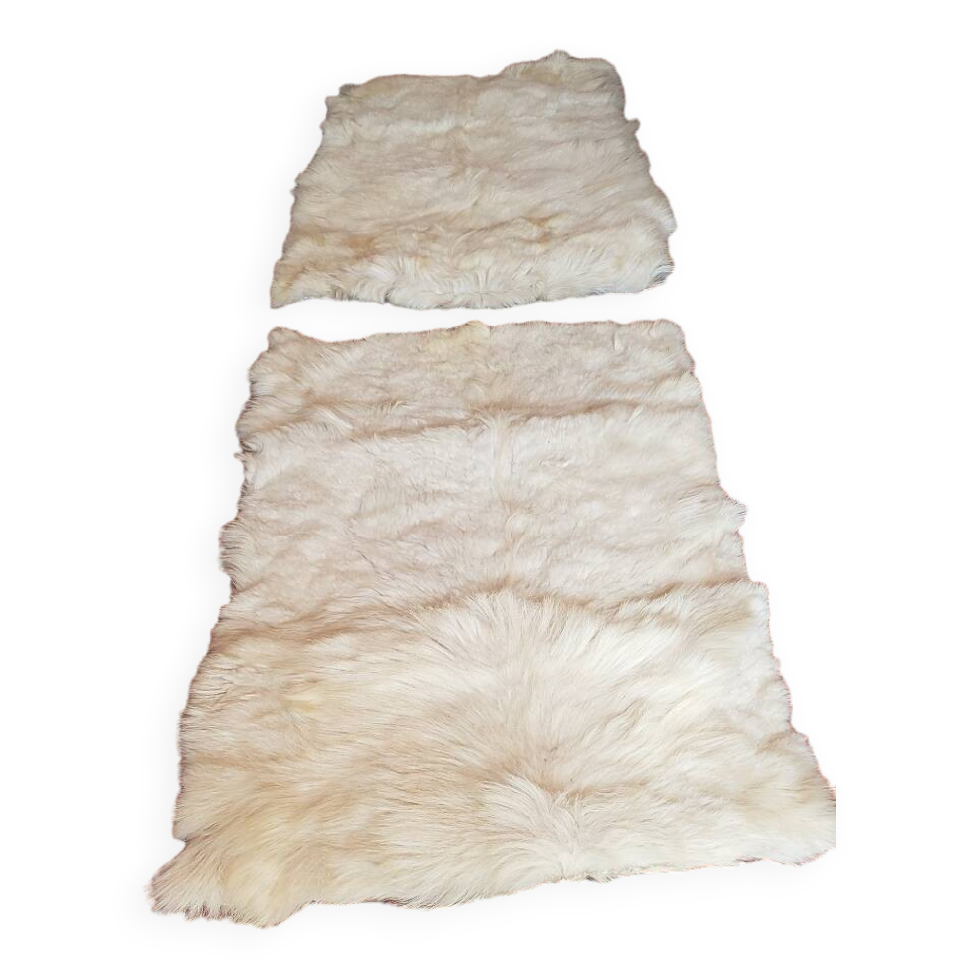 Beige goatskin rug in pair