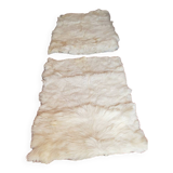 Beige goatskin rug in pair