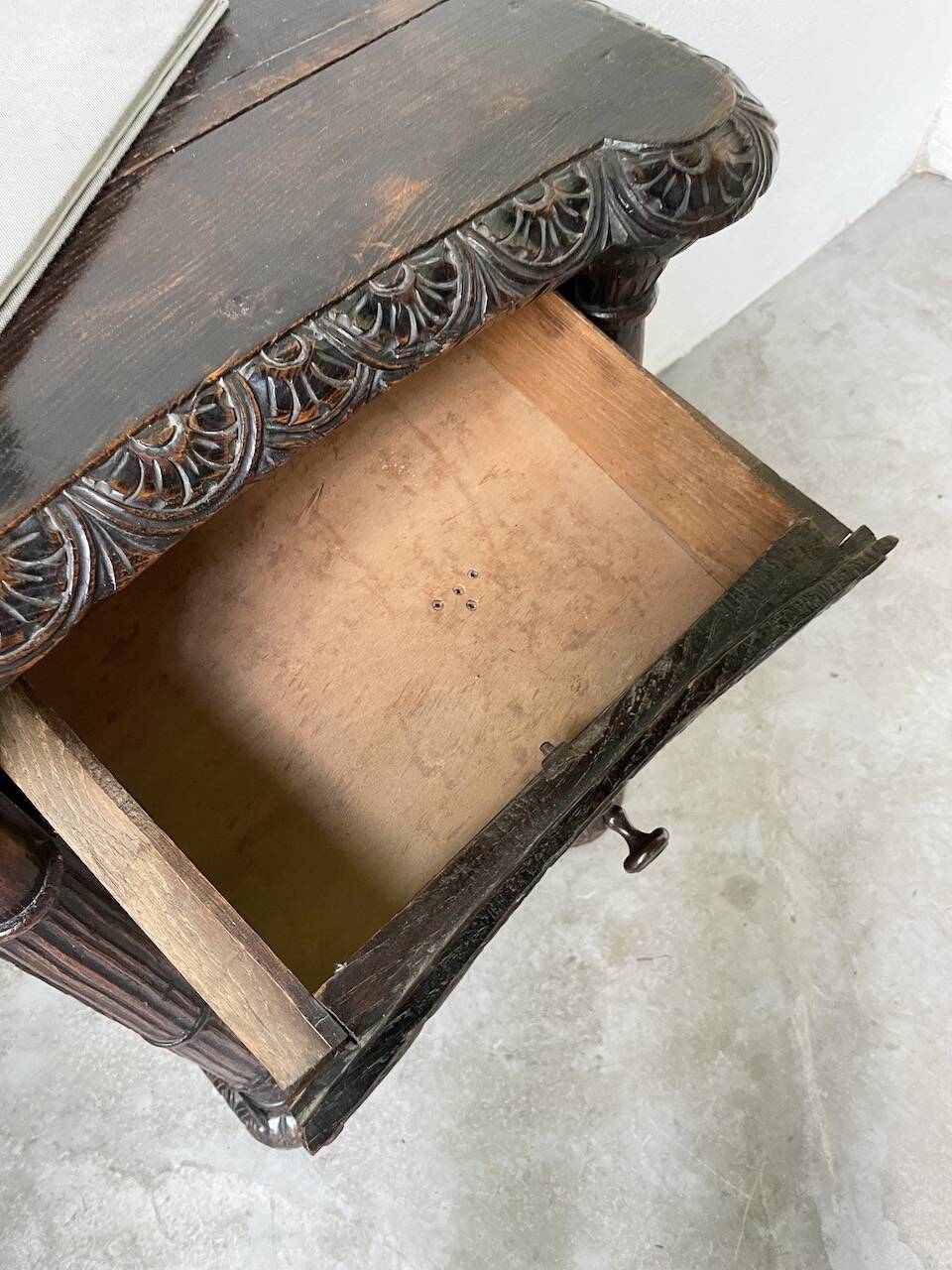 19th century chest of drawers in carved blackened pine