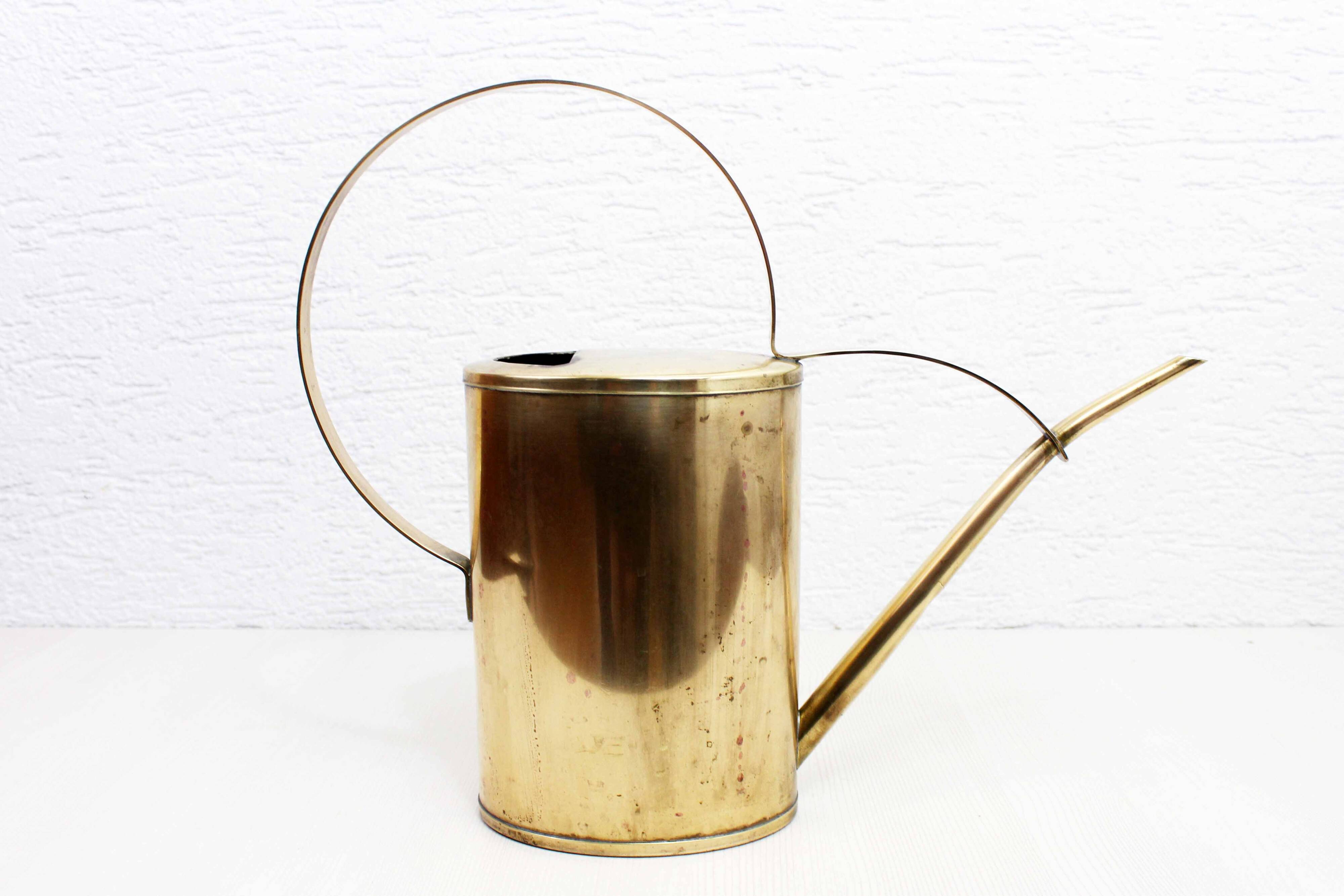 Vintage brass watering can