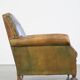 Green antique English cowhide leather armchair on wheels